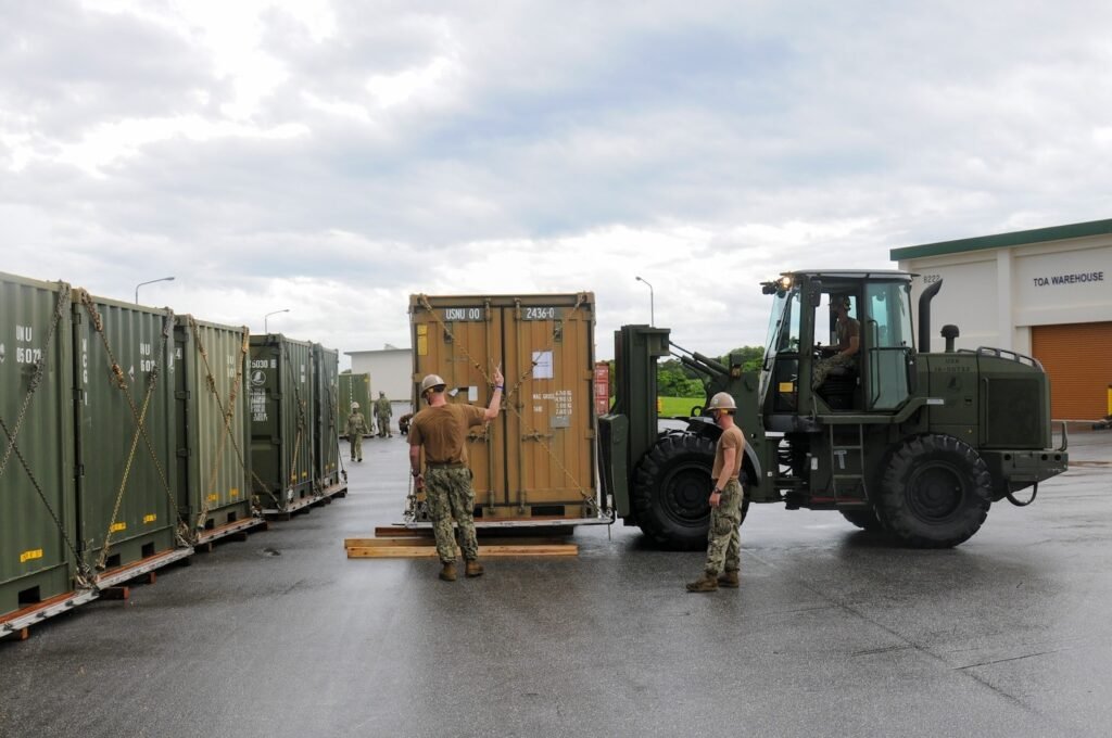 Construction machines lifting containers