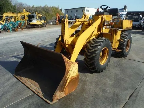 A Chinese used wheel loaders working on the site