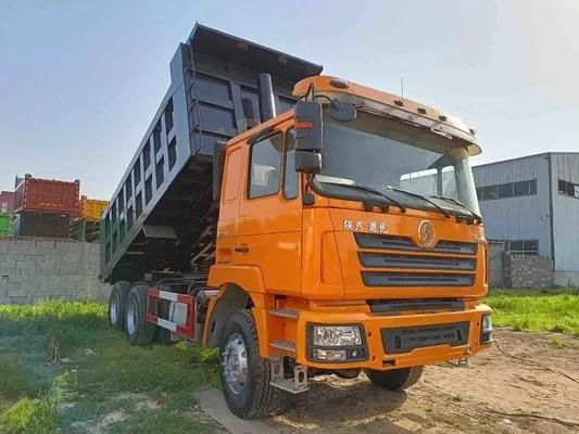 Orange used dump truck 